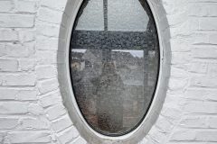 ovales-FEnster-zum-Wintergarten-scaled